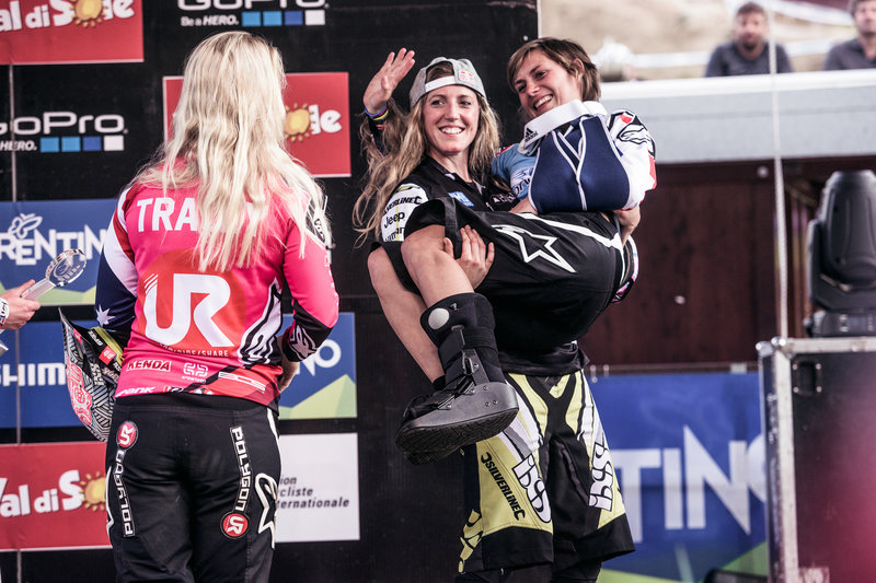 rachel-atherton-carries-the-injured-ragot-to-the-podium-at-val-di-sole-dh-world-cup.jpg