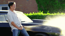 spray-water-the-babysitter.gif
